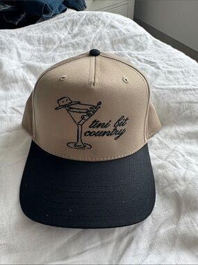 OTTO Two-Tone Beige and Black Trucker Hat with Graphic